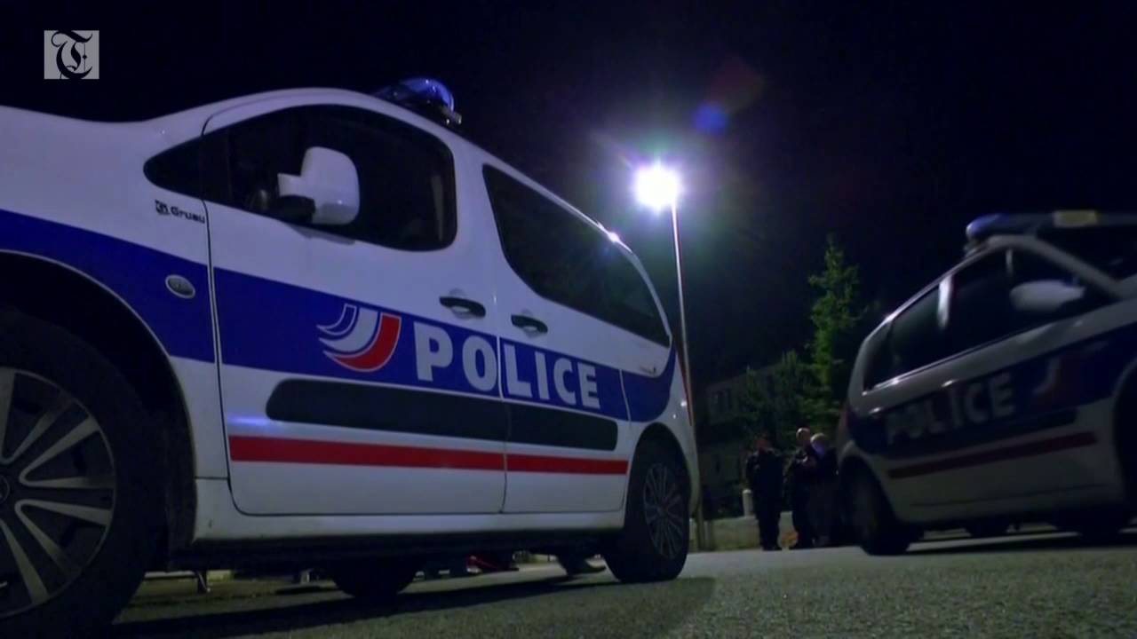 French police commander stabbed to death in front of his home