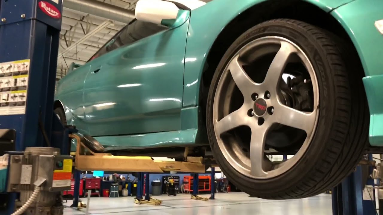 Inspecting a 235,000 mile 2004 Toyota Celica GT-S before a road trip.