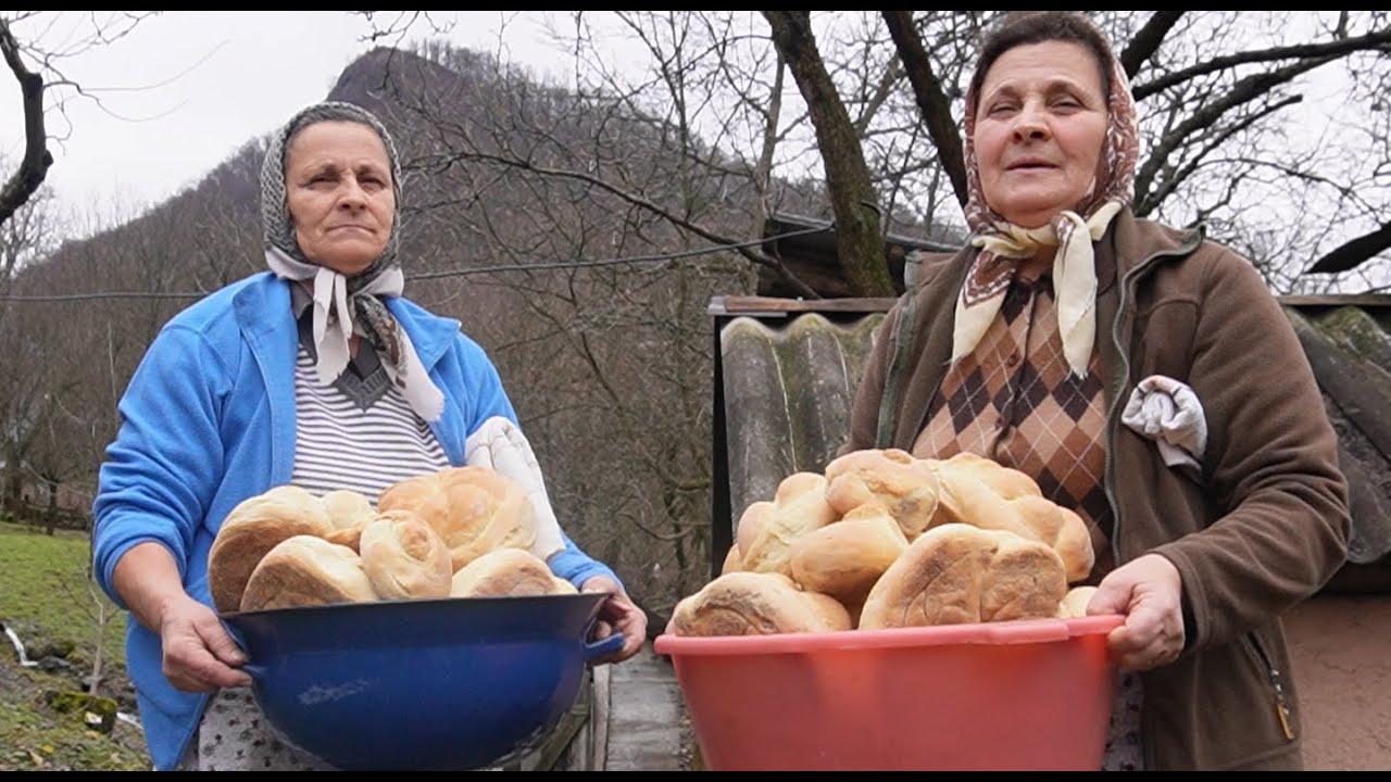 Sisters baking bread high in a mountain village.