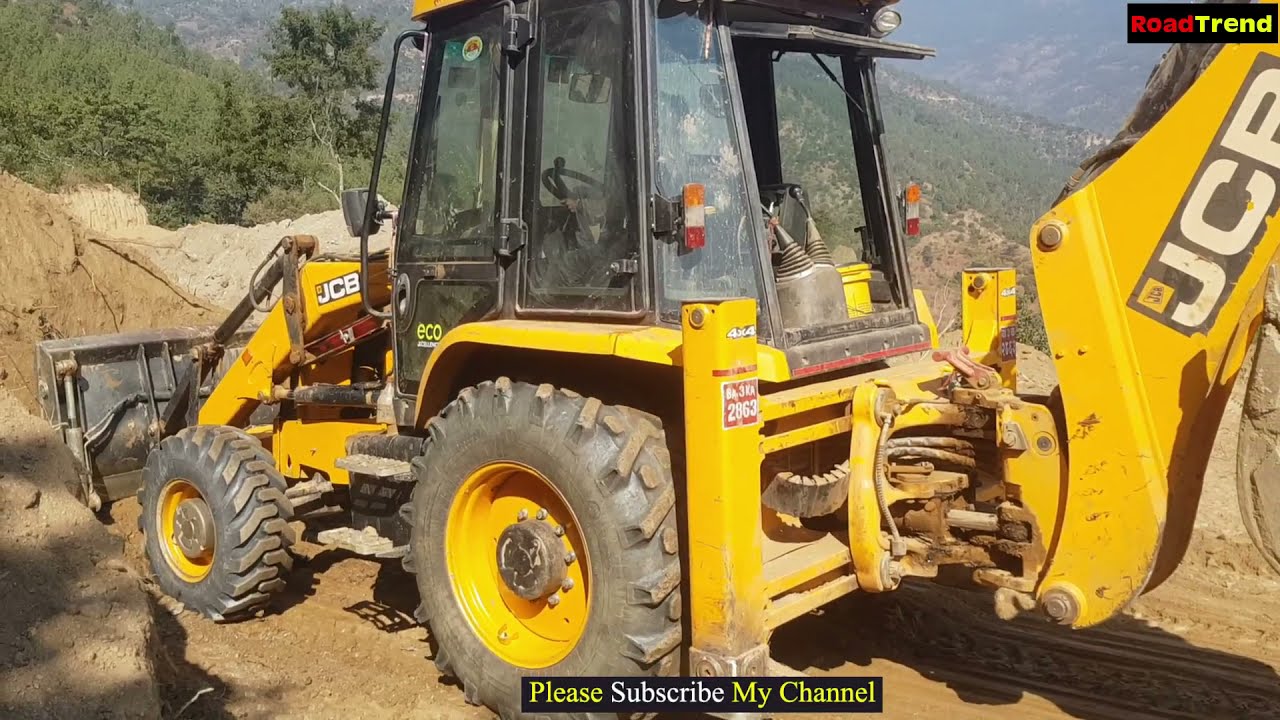 JCB Backhoe machine removing dirt in hill side- Excavator machine cutting sloppy hill machine work