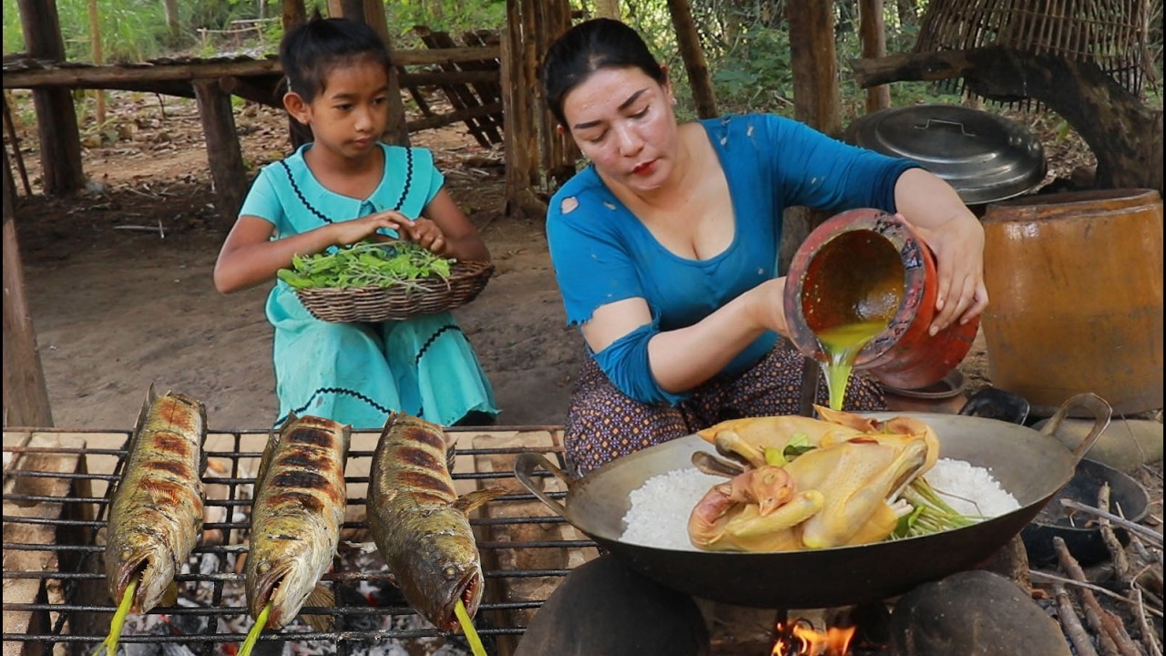 Steamed chicken with salt and grilled fish for dinner tasty delicious in the forest