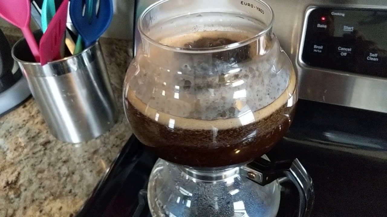 Brewing coffee in antique Cory vacuum pot