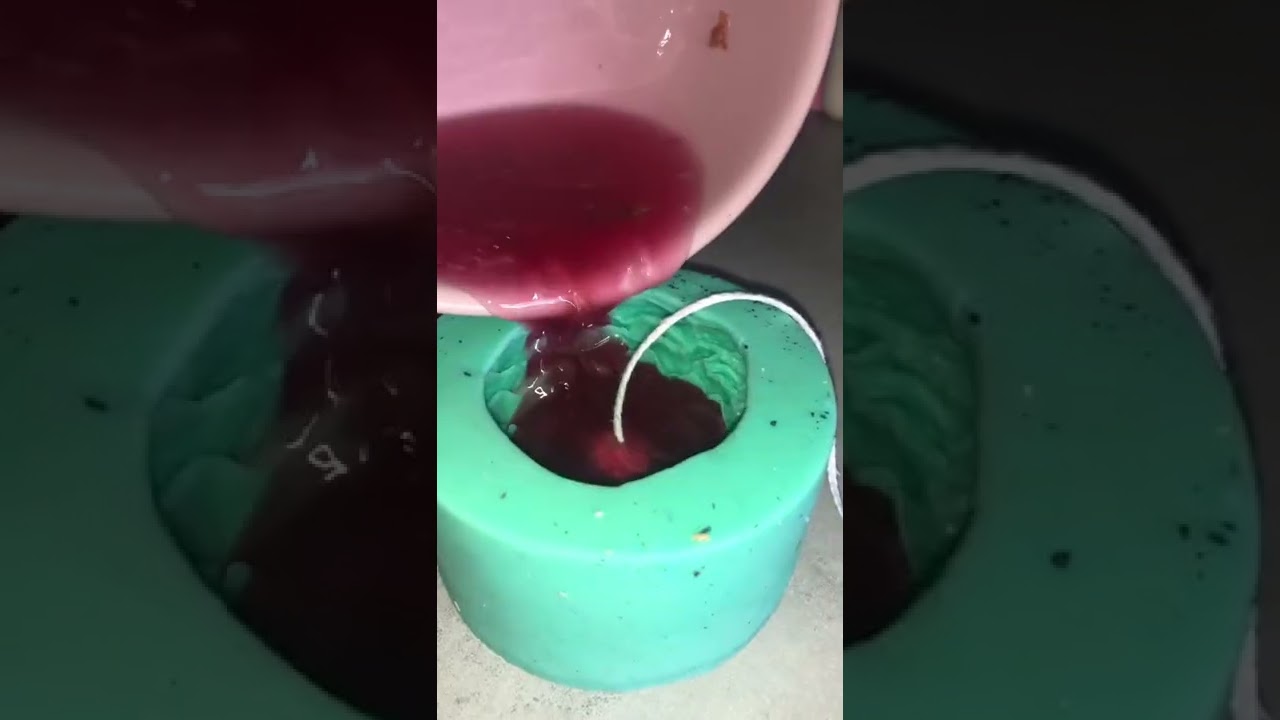 POURING HOT WAX INTO A MOLD