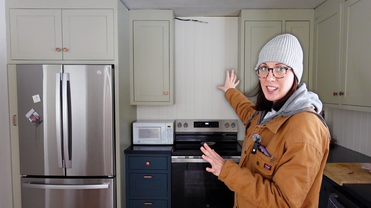 This transformed our kitchen:  Range hood and under cabinet lighting installed!
