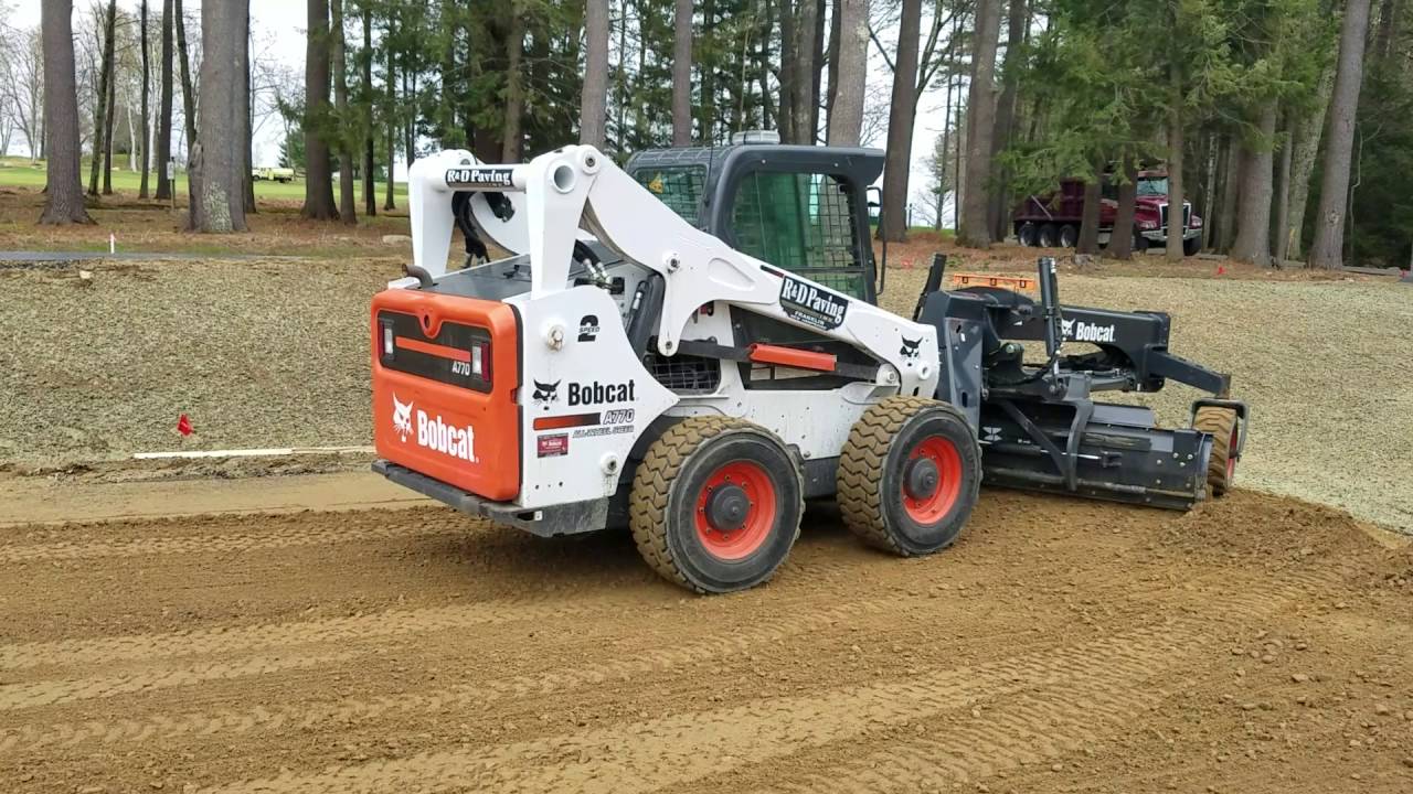 R&D paving grading with Bobcat A770 and grader attachment