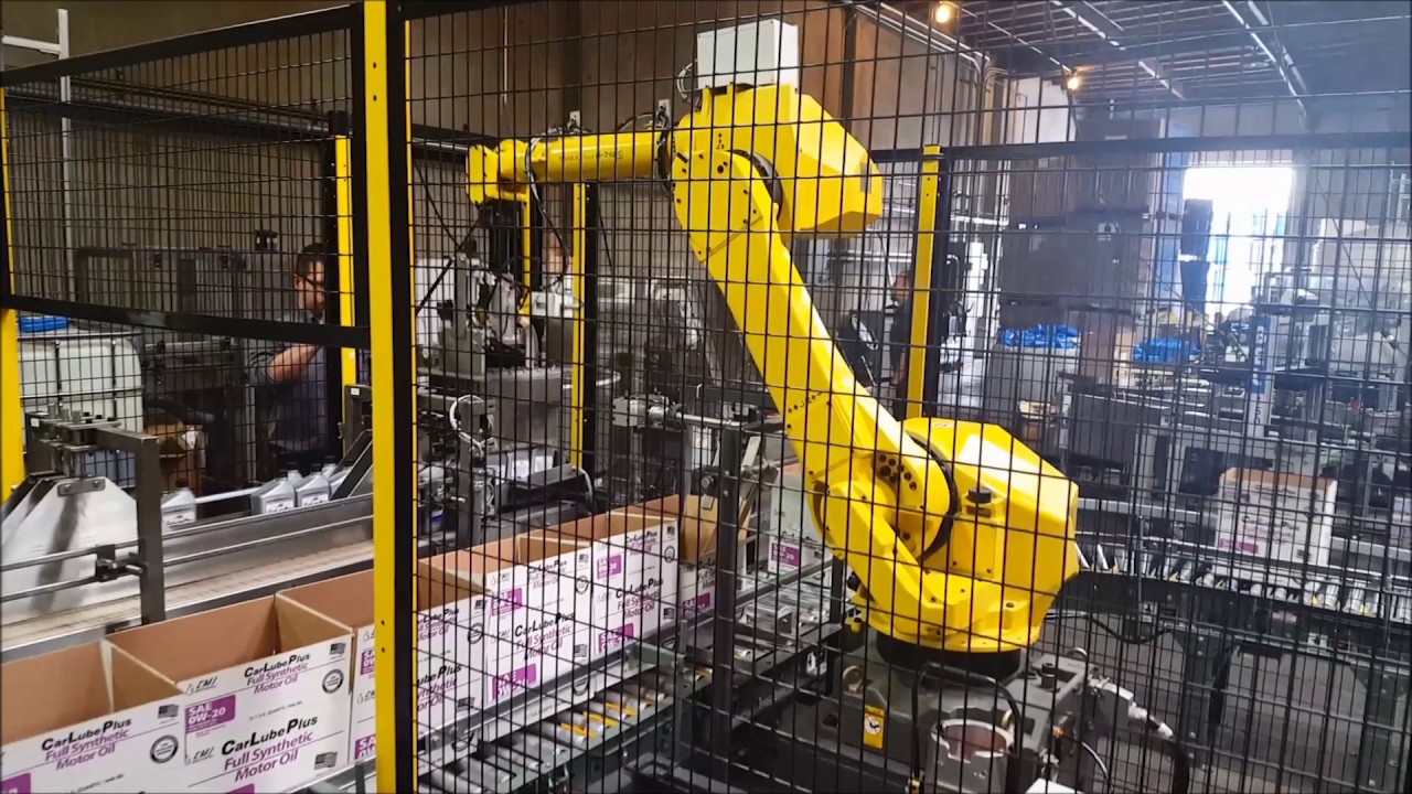 Robotic Case Packing System for Motor Oil Quart & Gallon Bottles - TransAutomation Technologies
