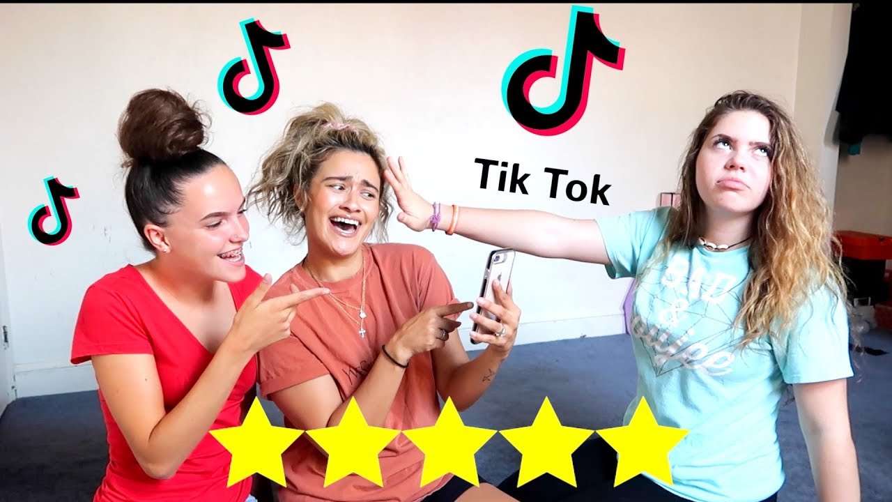 RATING MY STEP DAUGHTERS TIK TOK VIDEOS .. (SHE STARTS CRYING!)