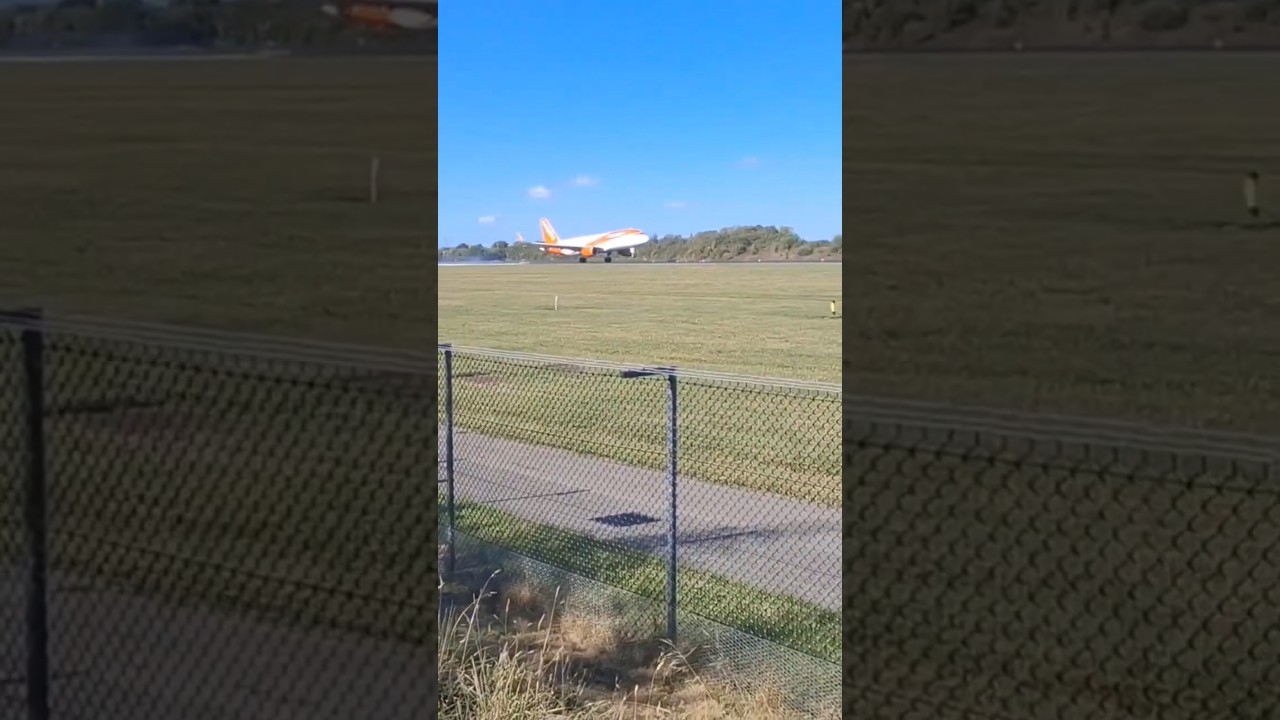 Tyre Smoke G-EZOF Airbus A320-214 easyJet - 05R Manchester Airport Arrivals Landing Runway 2