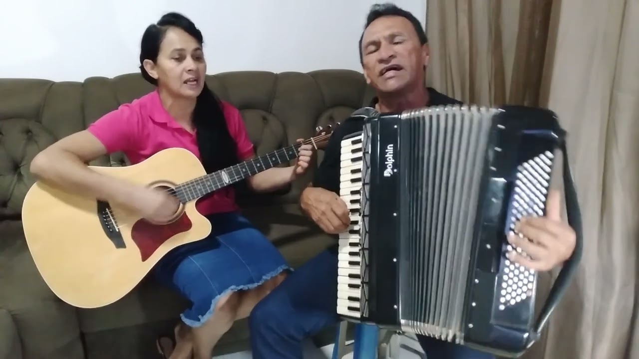 madeiro lavrado de Luiz de Carvalho com a dupla Elza e Mariano