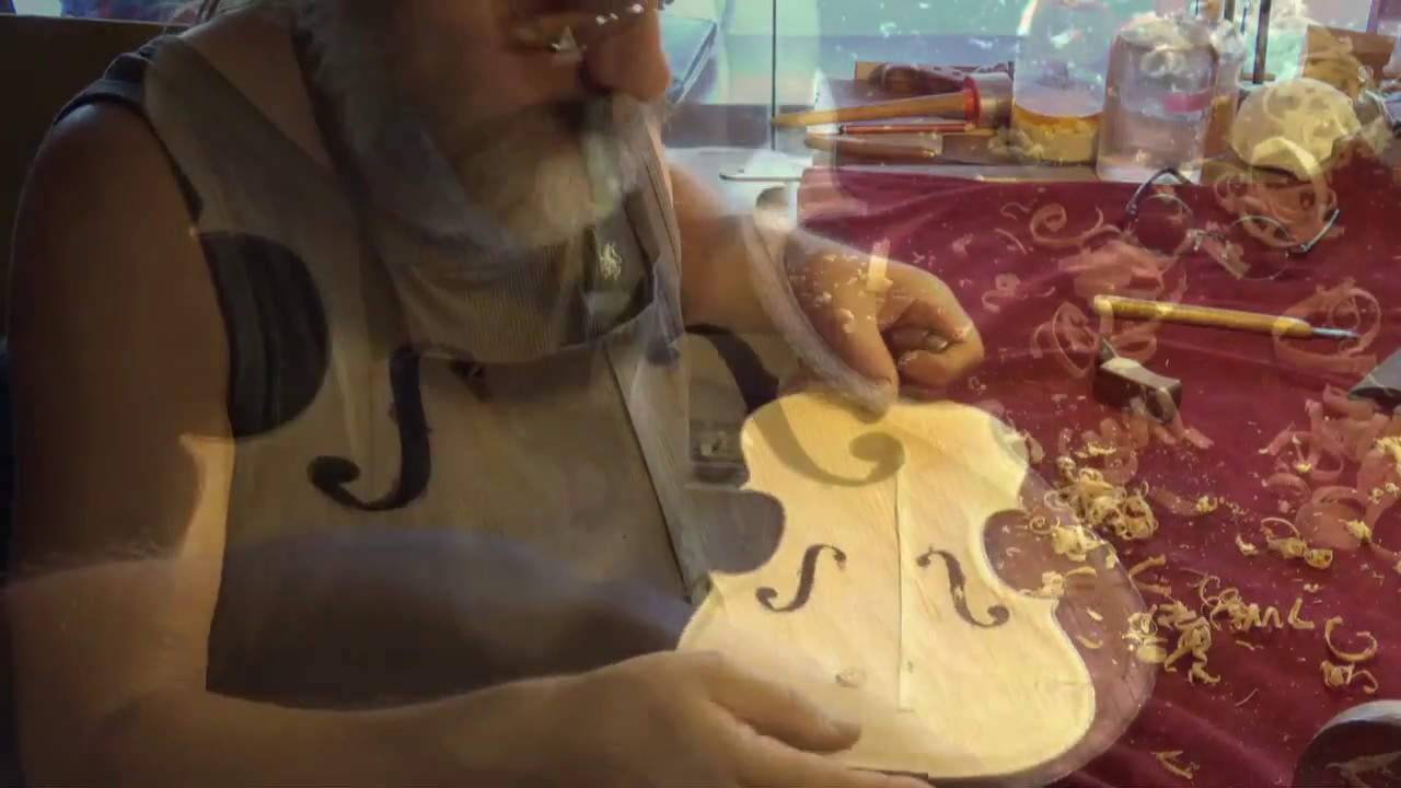 Removal of an old bass bar from a violin & cello
