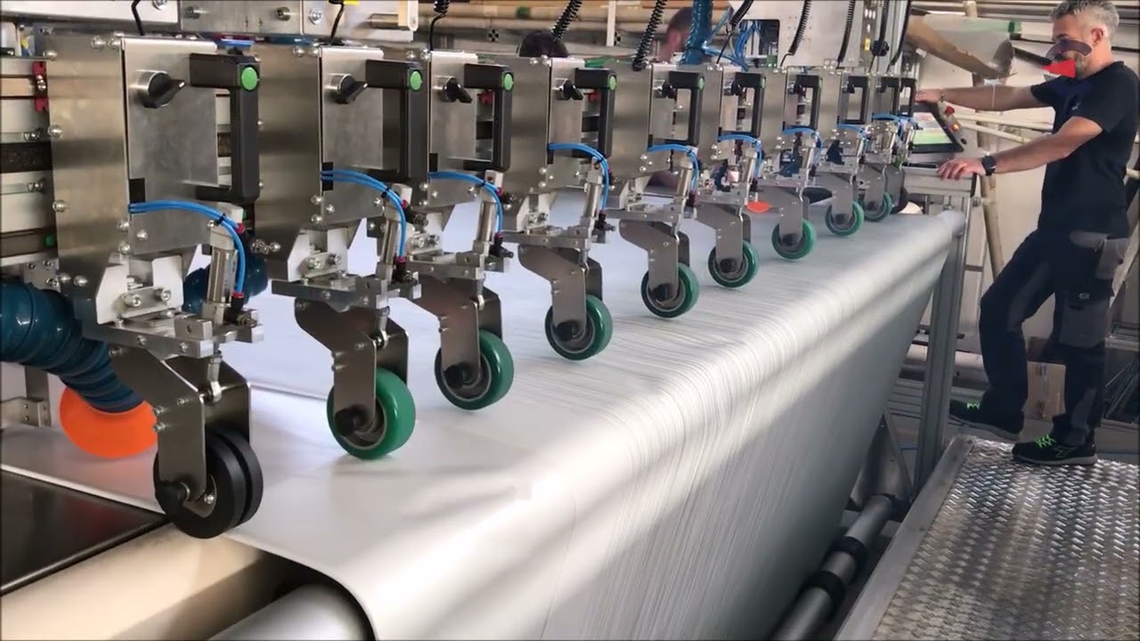 SM-450-SA | Automatic multiple roll welding machine with hot air technology