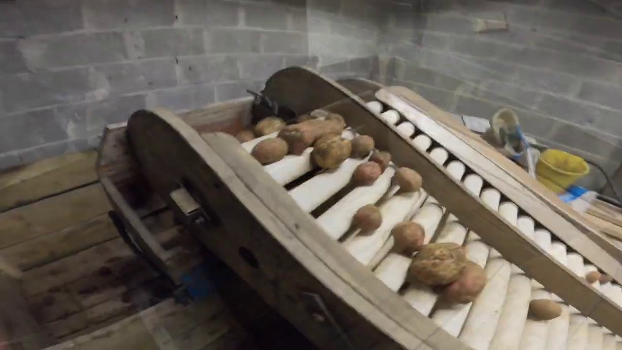 BIG SPUDS, LITTLE SPUDS, STONES AND CLAY - POTATO GRADER