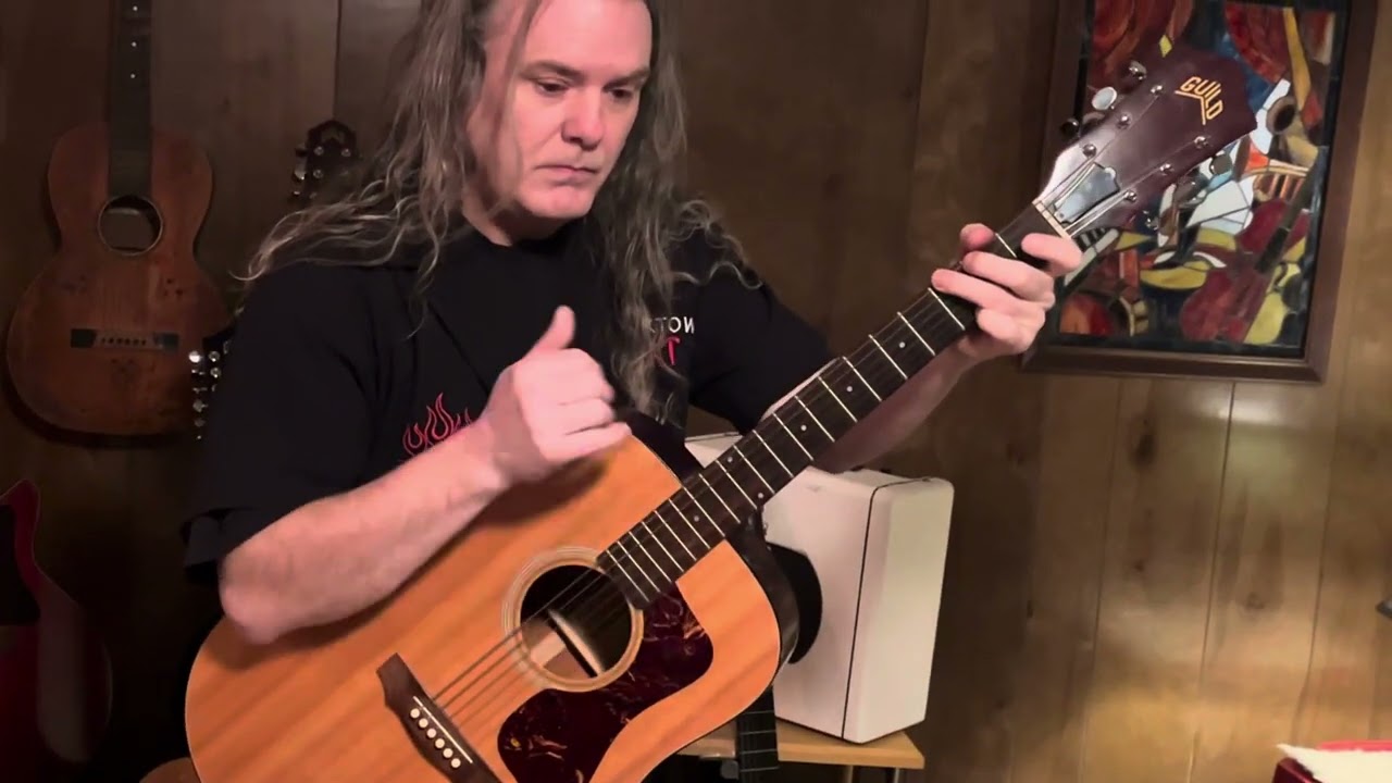 History of Guild Acoustic guitars | dozen spruce top guitar comparison at Rocktownmusic.net