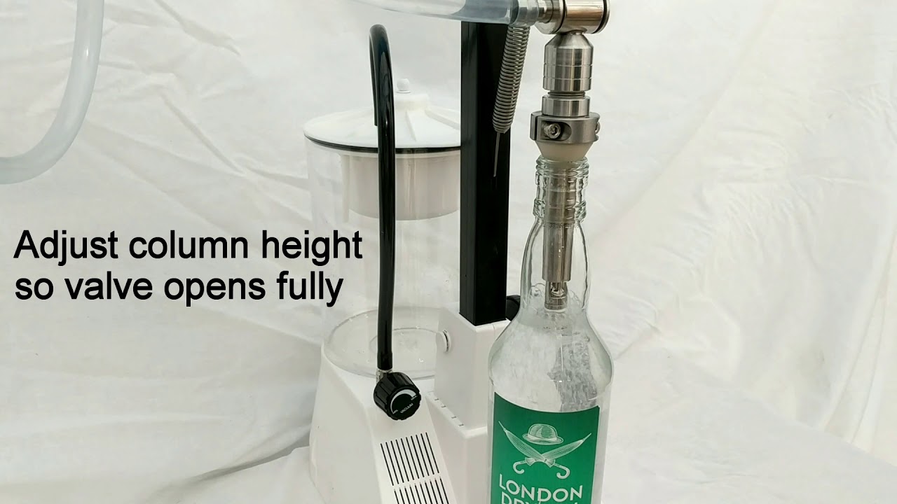 FL02A ENOLMATIC SINGLE HEAD VACUUM FILLER -  Nozzle Adjustments (Liquid Solutions)