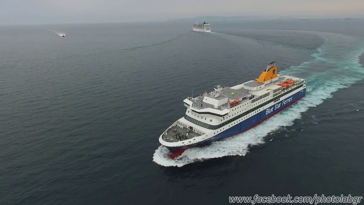 Aerial (drone) view - Blue Star Patmos entering Piraeus port