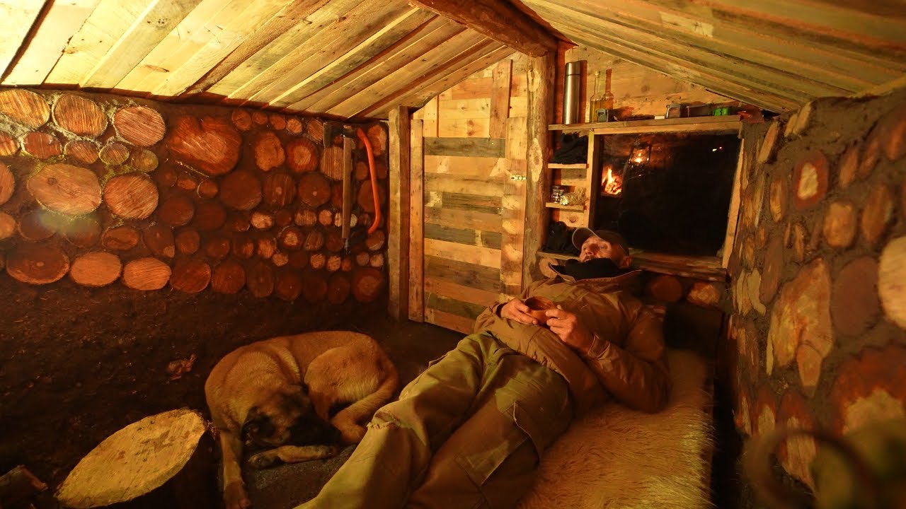 Wild camp high on the mountains with my Dog Bonny. Sleep warm and cozy in the cabin