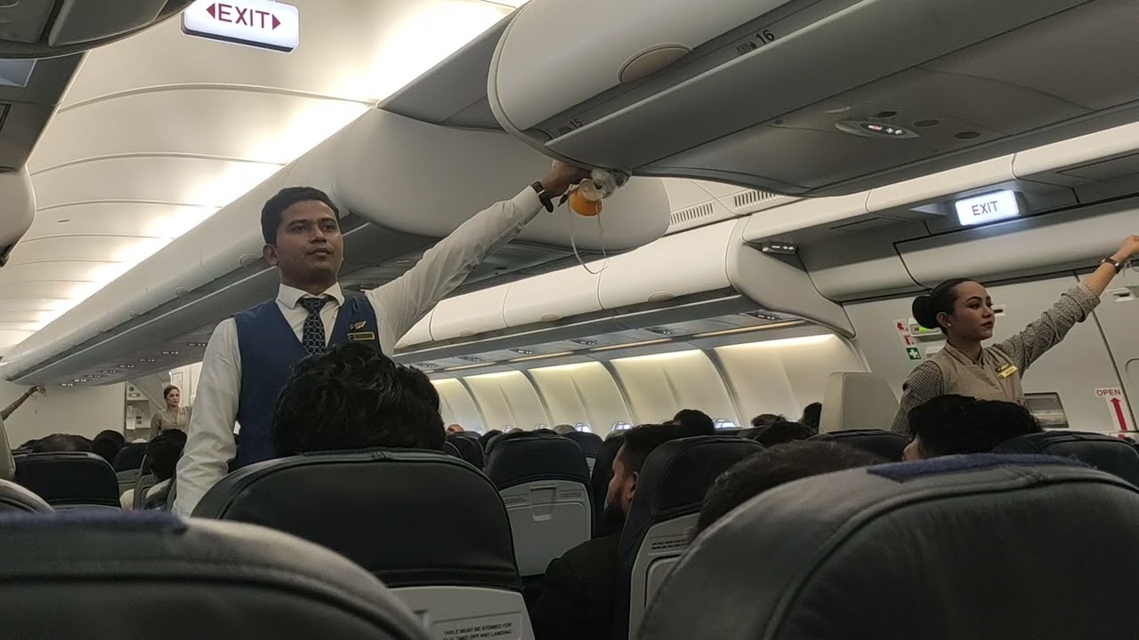 Us-Bangla Airbus A330✈️male & female cabin crew demonstrating safety instruction//Malaysia to Dhaka