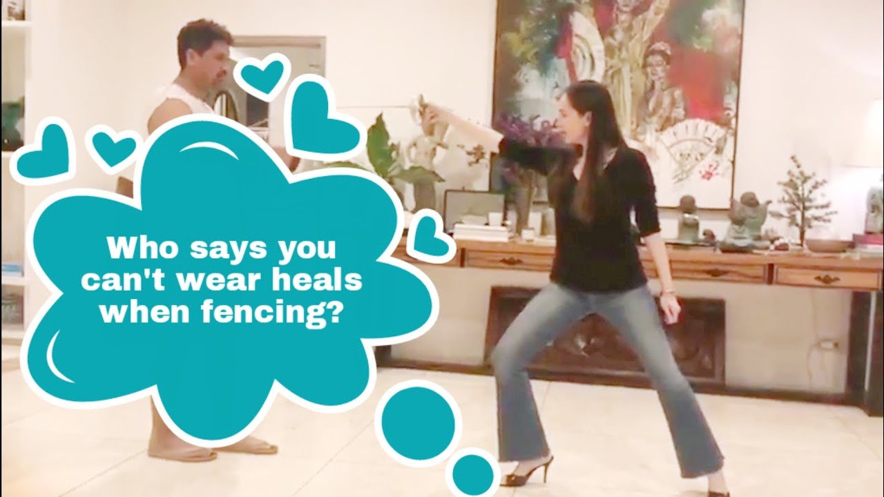 LUCY TORRES-GOMEZ FENCING IN STILETTOS