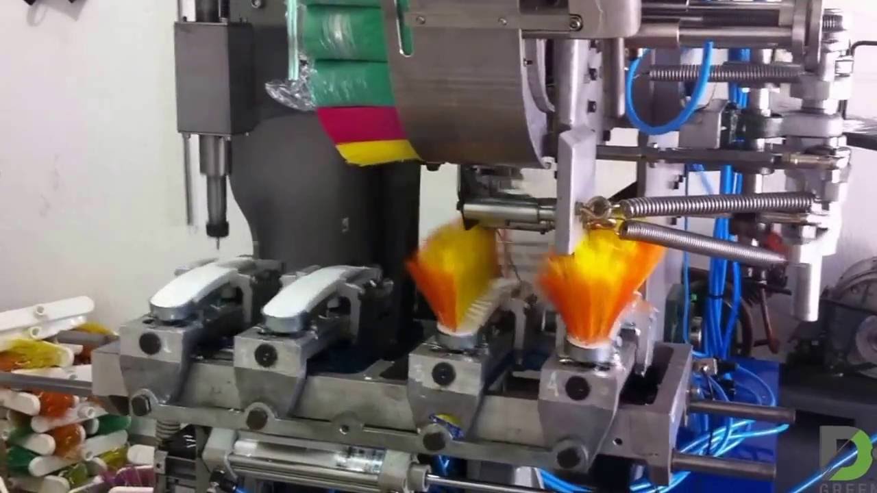 INSERTADORA DE ESCOBAS Y CEPILLOS