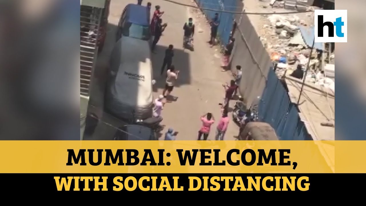 Watch how a Covid-19 survivor was welcomed by neighbours in Mumbai