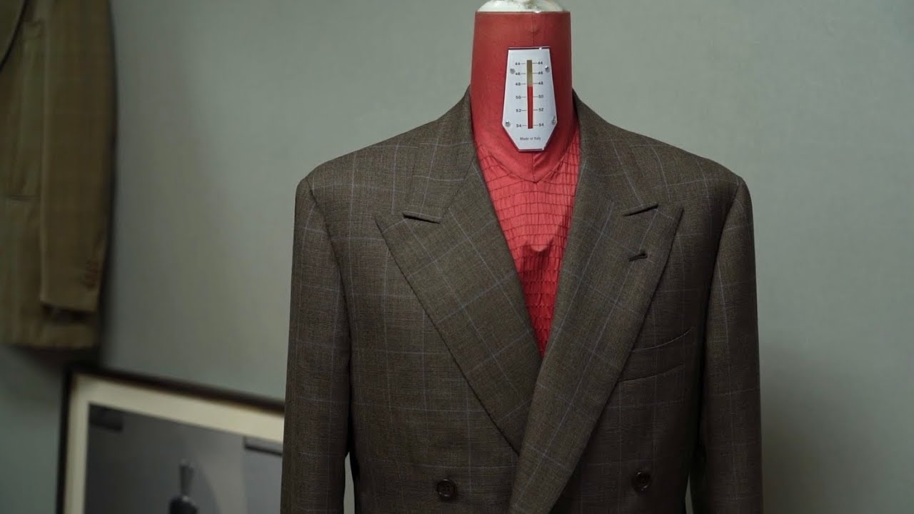 Creating a bespoke suit jacket made from Holland & Sherry wool.