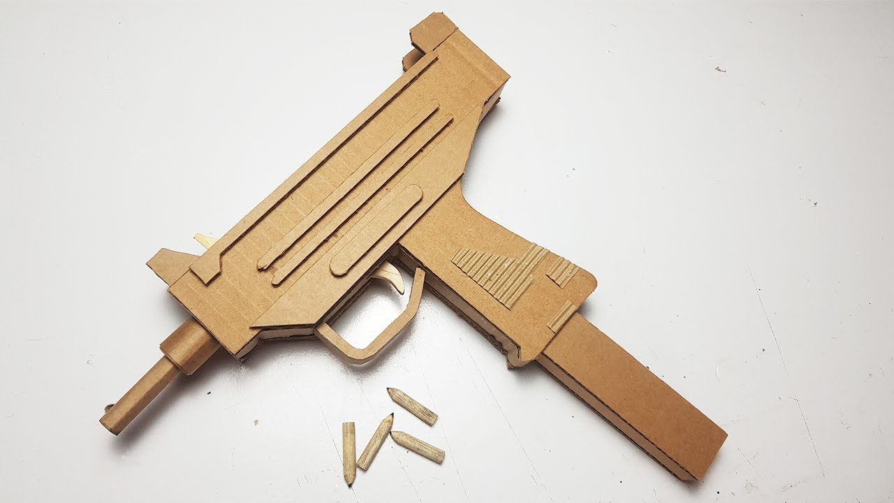 Como Fazer Uma MINI UZI de Papelão Que Atira