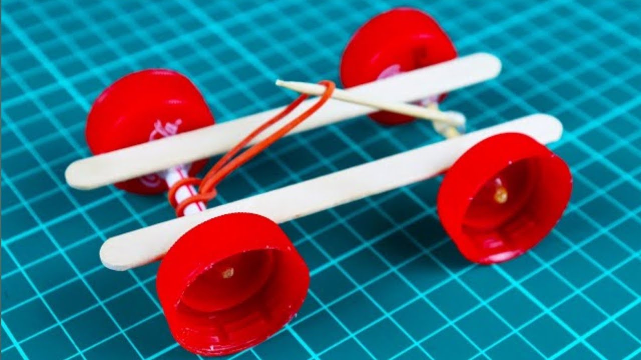 How to make a mini Rubber Band Car (Simple Car toy )