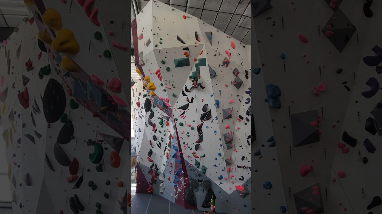 Orange/black 5.12a