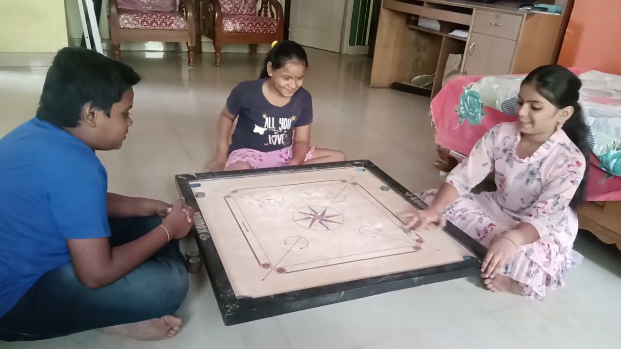 Playing Carrom Game
