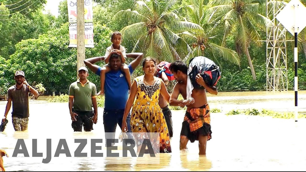 Sri Lanka struggles to deliver aid to stranded flood victims