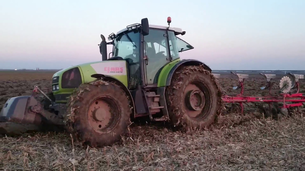 Claas Ares 836 + Vogel Noot XMS - Ploughing / Oranje