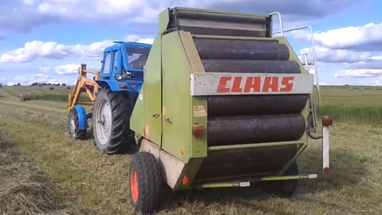 Про сено заготовку и рулонный пресс claas.