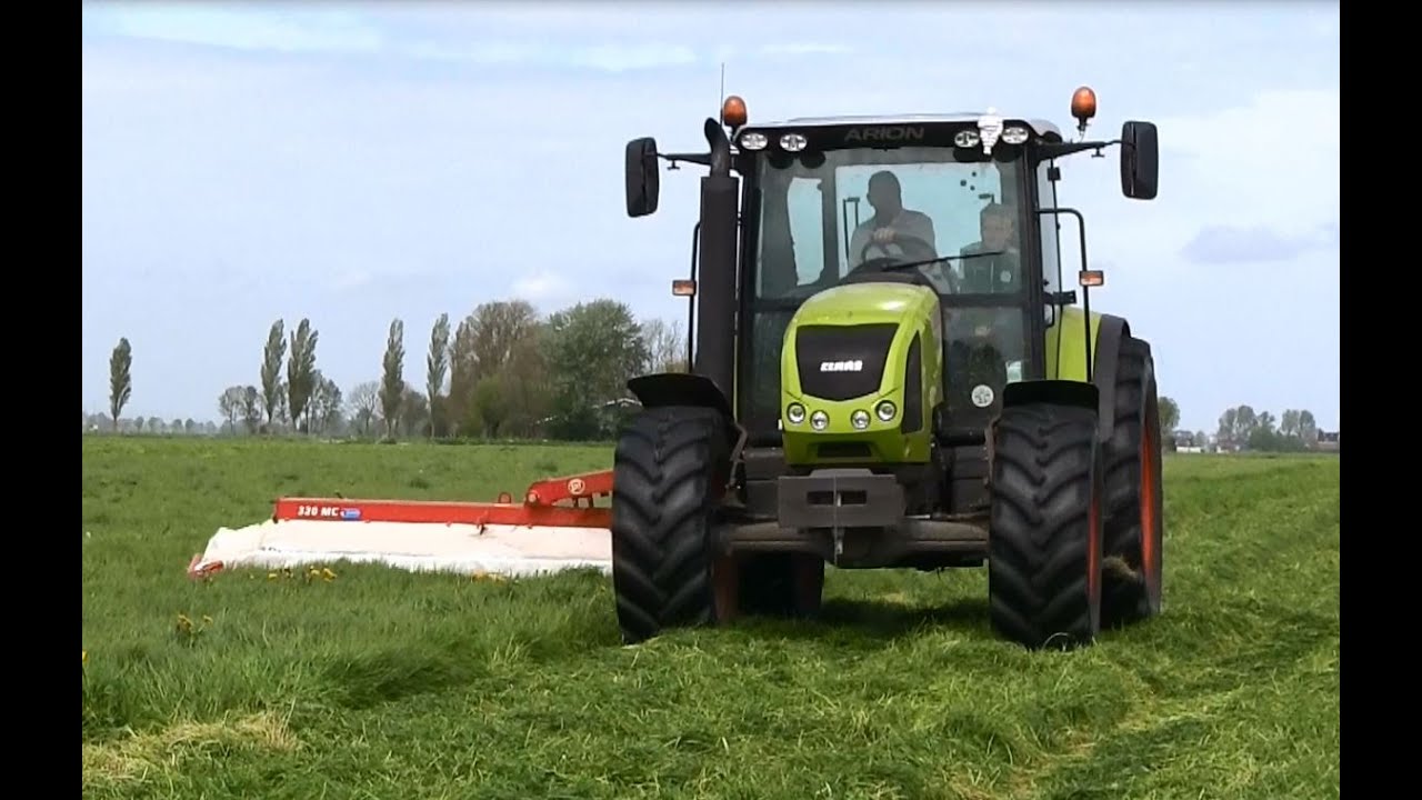 Grasmaaien met CLAAS 410 Arion. Melk.v.b.Ritsema Thesinge.