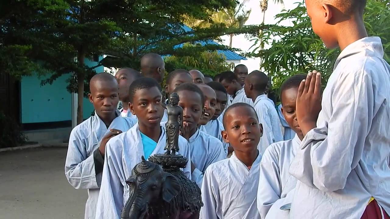 Bathing to the Buddha by Kind heart Africa children in Tanzania - Africa