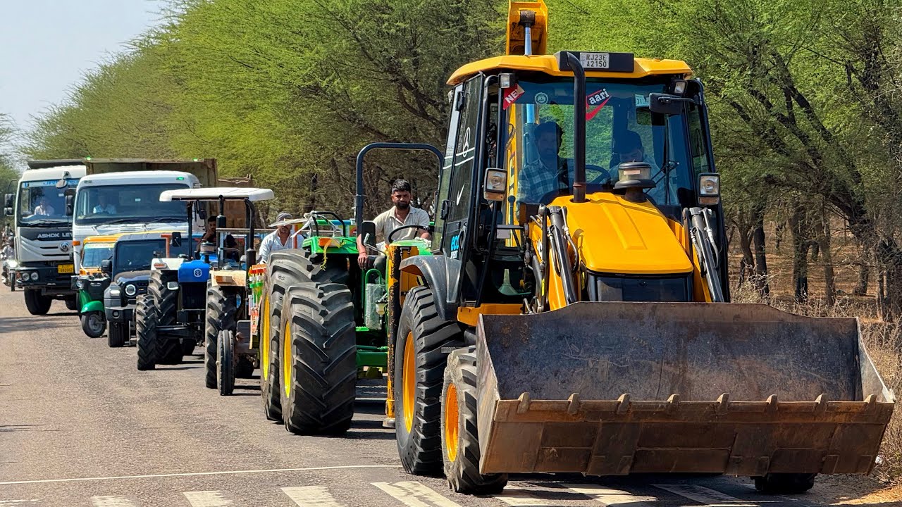 Jcb 3dx loading Mud in TATA Tippers Tractors Swaraj 855 Fe New Holland 3630 Tractor jcbThar Truck.  