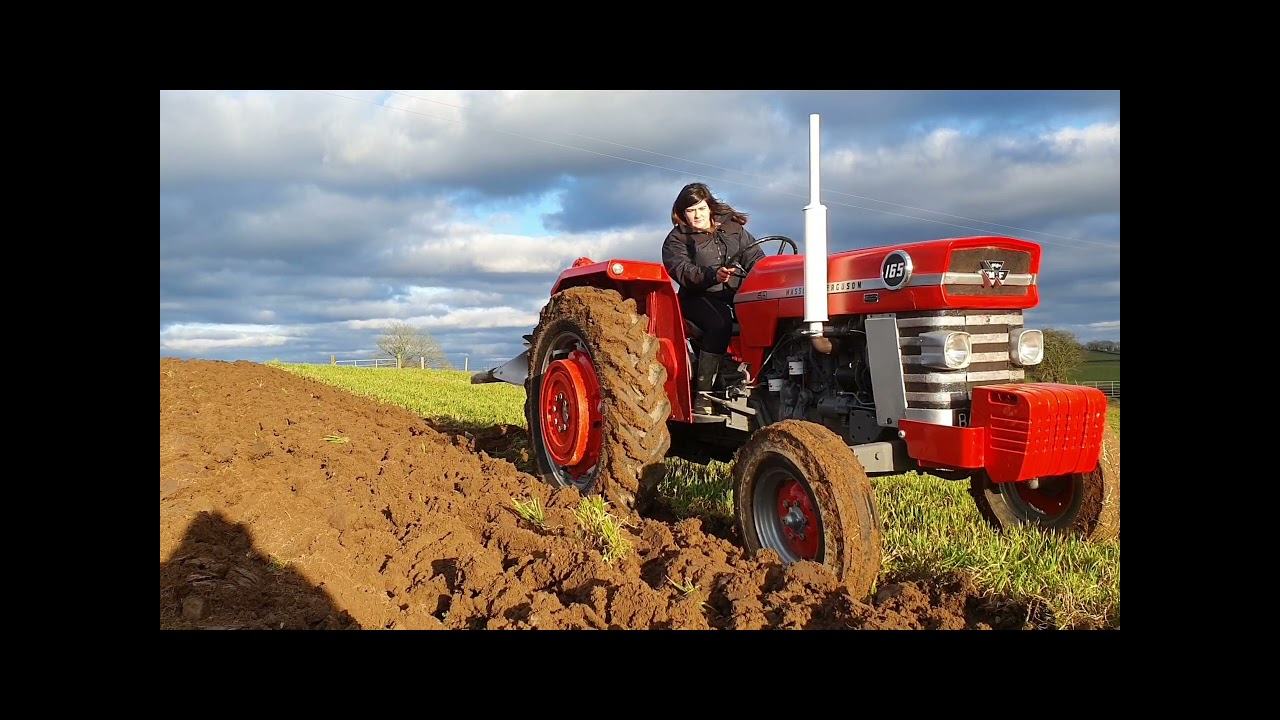 Spring time ploughing with the 165