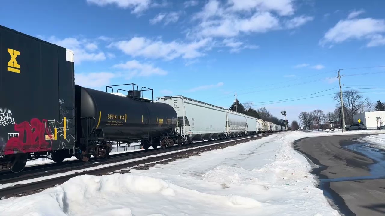 CSX M331 clears McCordsville, IN with a friendly crew and LTEX GP38 trailing 2nd
