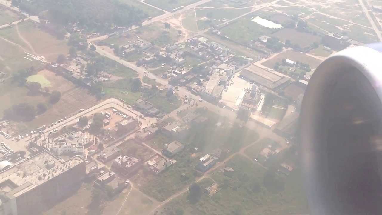 (HD) Landing at Chandigarh Airport, India with a view of the Mohali stadiums.