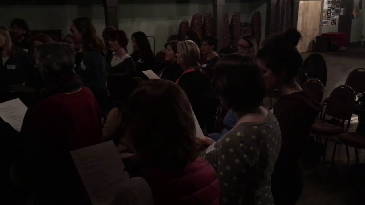 Girls on fire (and supporters) sing for International Women's Day - Instant Choir in East Van!
