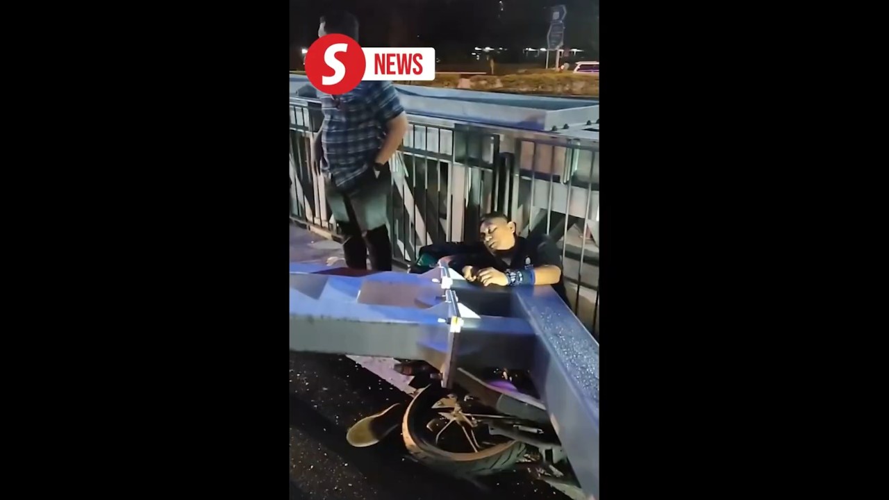 Motorcyclist crushed by fallen barrier, survives with broken hand in KL