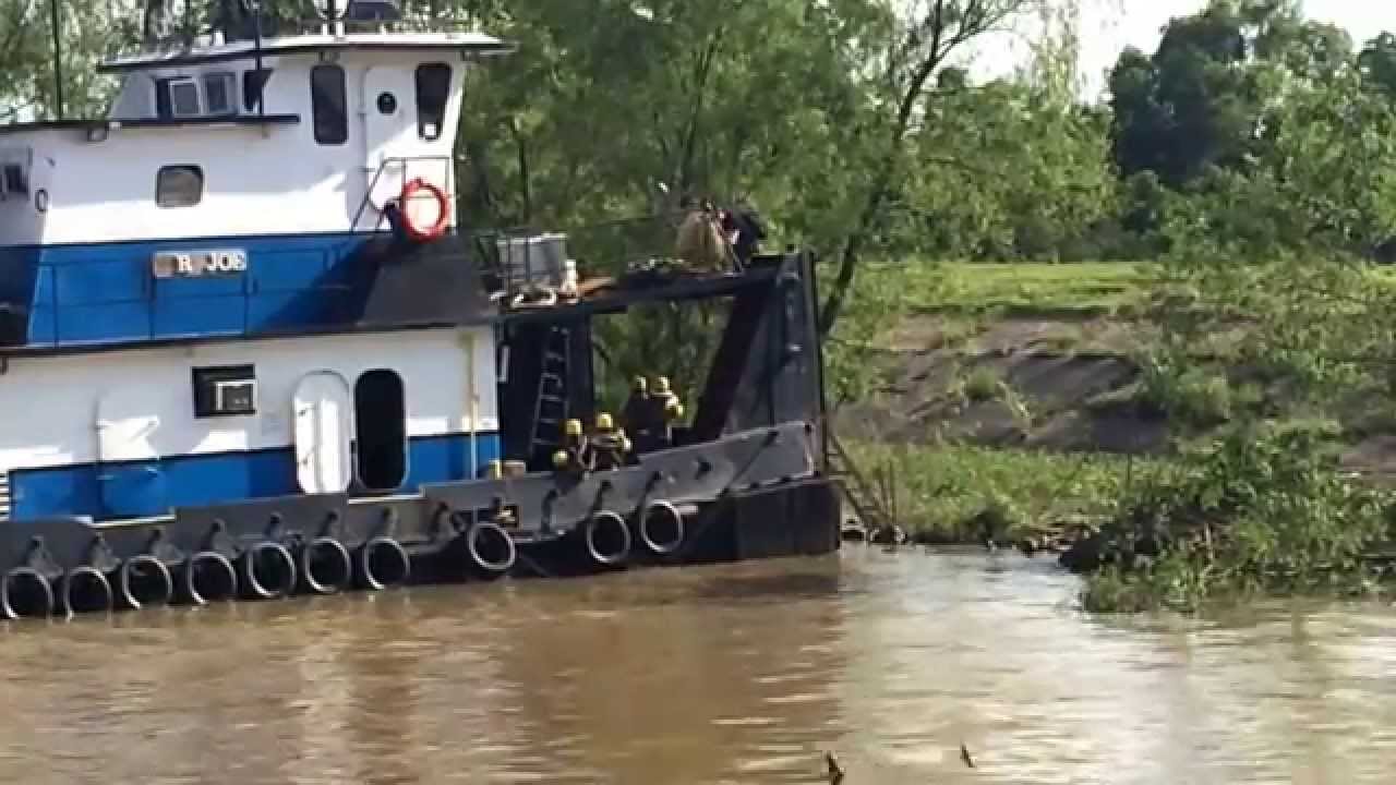 Mississippi River tug boat deck hand disembarking