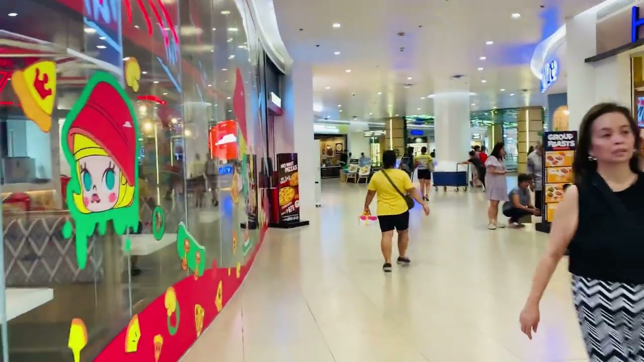 Walking at the mall.  Gateway 2 Araneta Cubao, QC. Metro Manila Philippines. March 08,2026.