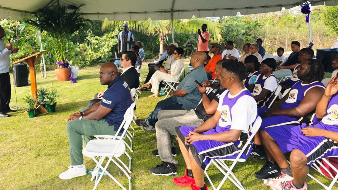 Fred Mitchell addresses the commissioning  ceremony of the King's Court  basketball  court 