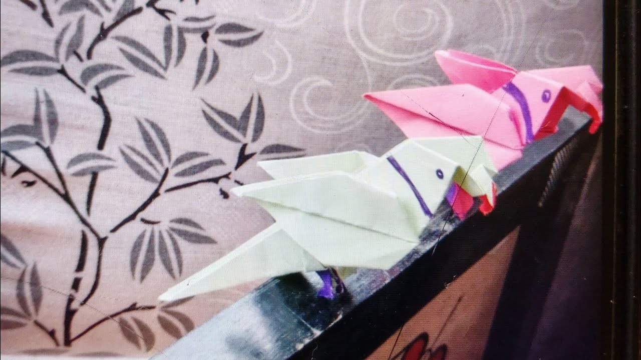 A beautiful parrot with paper origami paper parrot Kaise banaen