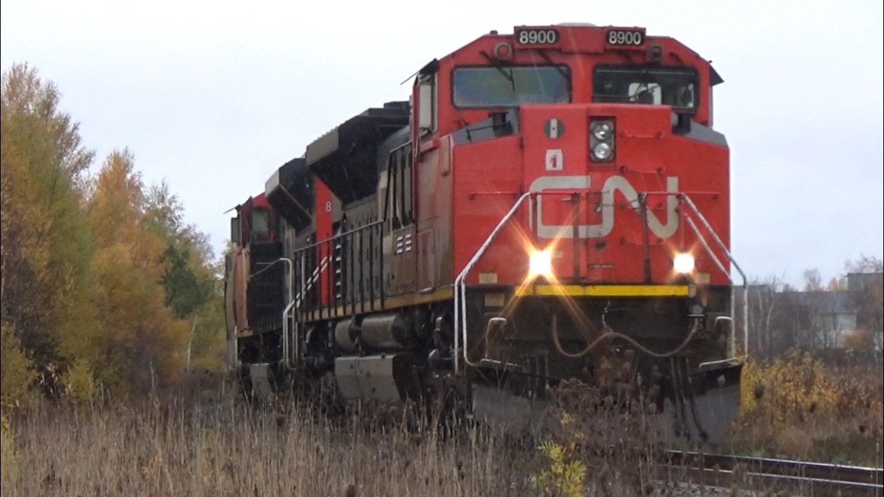 Decent Size Freight Train CN 507 Rolling thru Sackville, NB on Overcast Afternoon