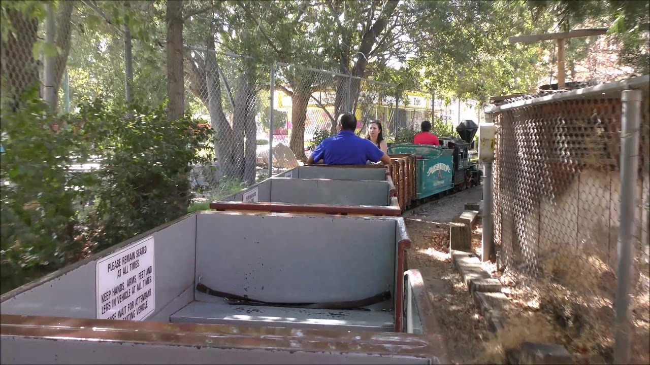 Railroad Train Ride Attraction Onboard Back POV in Full Castle Park amusement Park Riverside CA