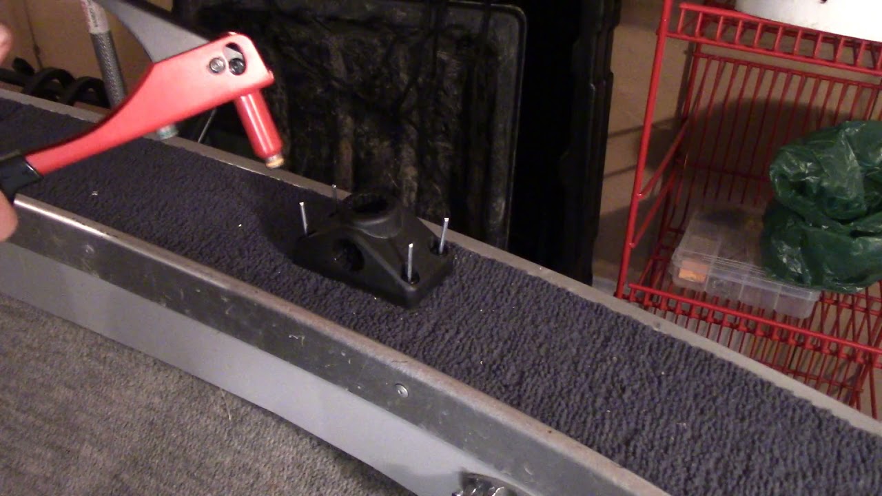How to install a scotty rod holder in an aluminum boat.