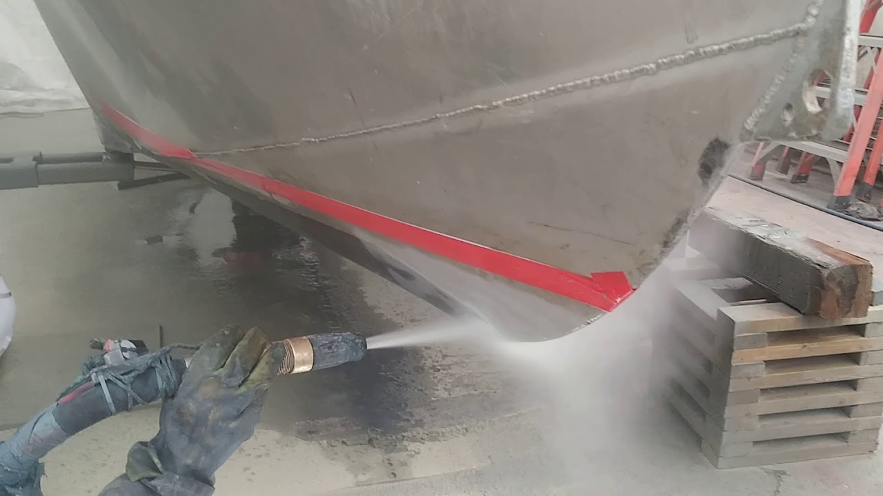 Aluminum boat blasting in our shop.