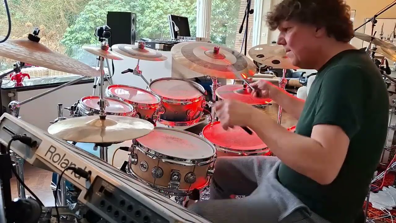 Drumming along the groovy Acid Jazz in 'Too young to die' by Jamiroquai