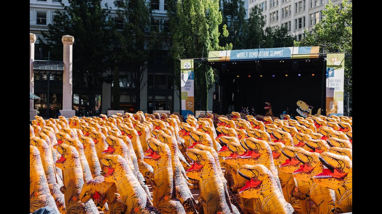 World Domination Summit - World Record Break - T-Rex Takeover - The Most People Dressed as Dinosaurs